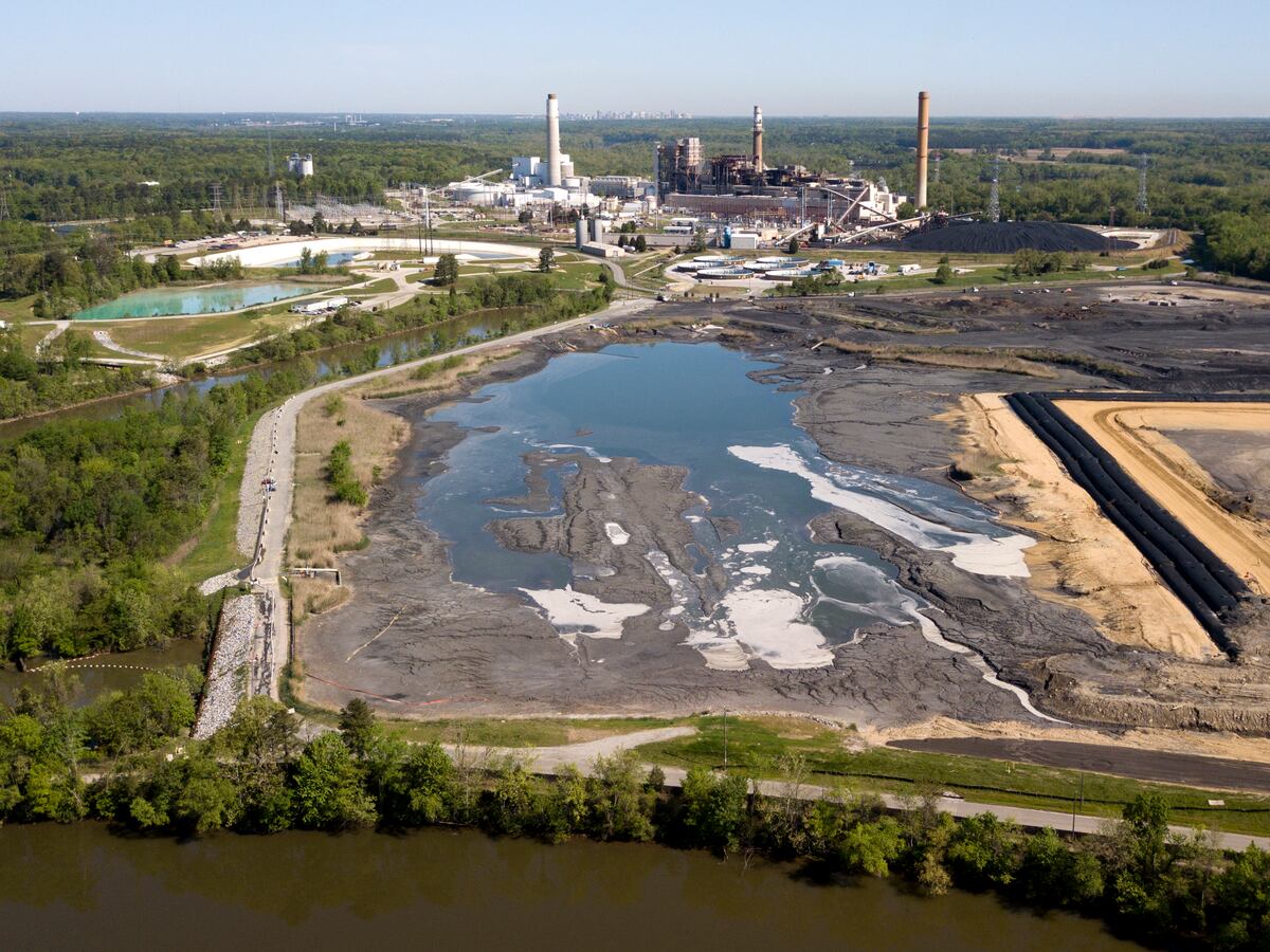 Power plant ash storage mound and pond